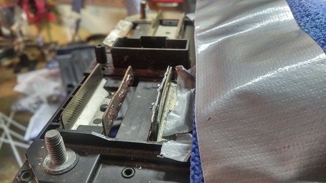 Flatten tabs off of bus bar